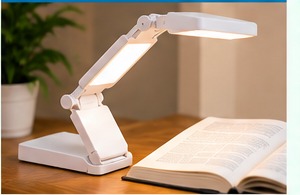 Adjustable portable task light positioned to illuminate a home activity